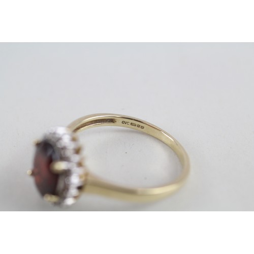 262 - 9ct gold garnet & diamond cluster ring (3.5g) ring size t/u