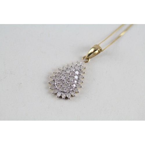 264 - 9ct gold diamond cluster pendant & chain (2.5g)