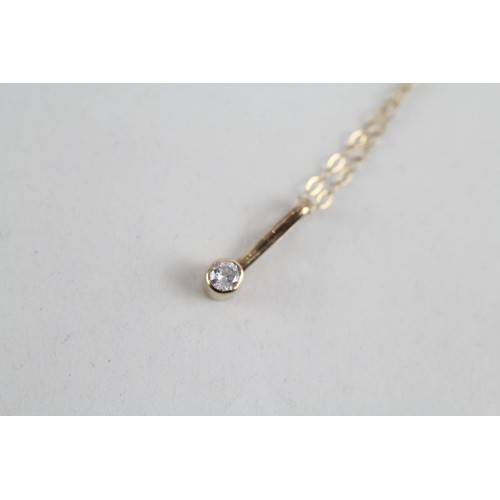 265 - 9ct gold diamond pendant & chain (0.6g)