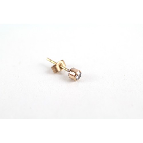 268 - 9ct gold diamond stud earrings (0.6g)