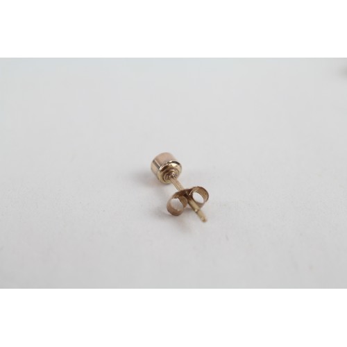 268 - 9ct gold diamond stud earrings (0.6g)