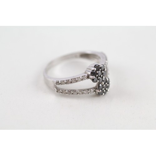 269 - 9ct white gold diamond & black diamond dress ring (2.8g) Ring size Q/R