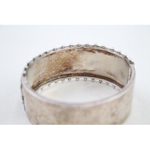 411 - Silver antique bangle (39g)