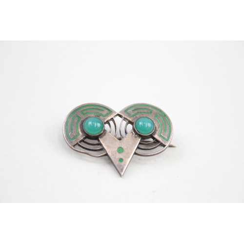 412 - Two silver enamel Scandi brooches (17g)