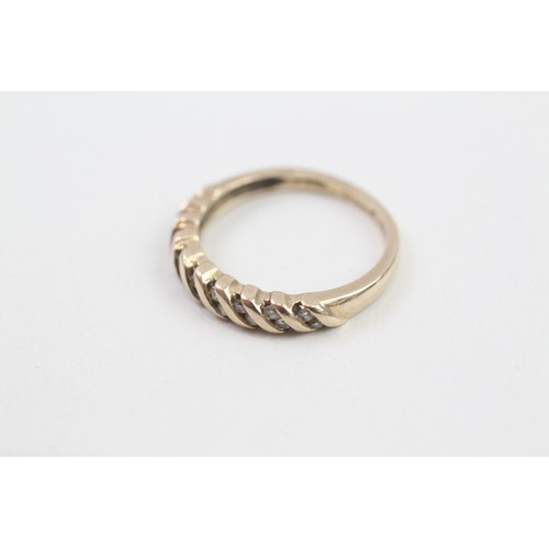 277 - 9ct gold diamond half eternity ring (2.4g) Ring size N