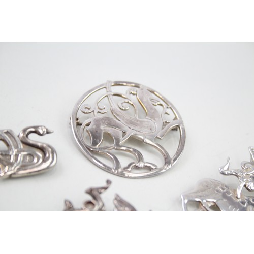 420 - Four silver Celtic brooches including Ola Gorie (53g)