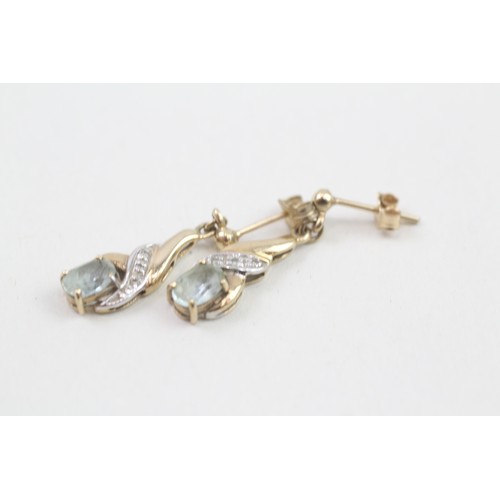 281 - 9ct gold blue topaz & diamond drop earrings (1.7g)