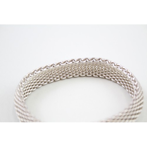 423 - Silver multi chain bracelet by designer Tiffany & Co (58g)