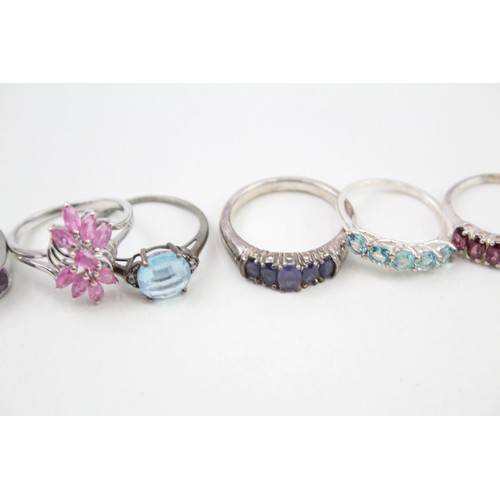 429 - A collection of silver gemstone rings including Ruby (27g)