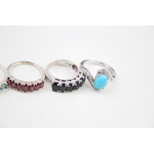 429 - A collection of silver gemstone rings including Ruby (27g)