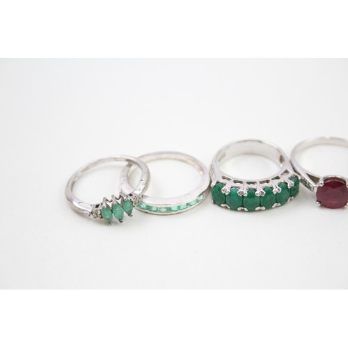 430 - A collection of silver gemstone rings including Emerald (21g)