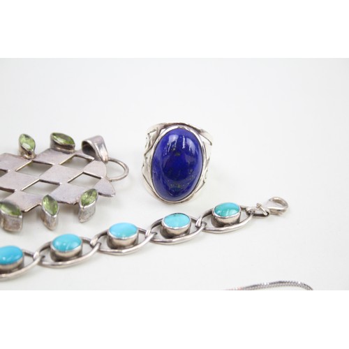 439 - A collection of silver gemstone jewellery including Lapis Lazuli (63g)