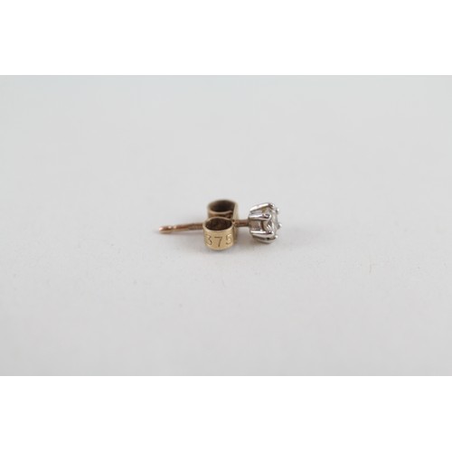 292 - 9ct gold diamond stud earrings (0.6g)