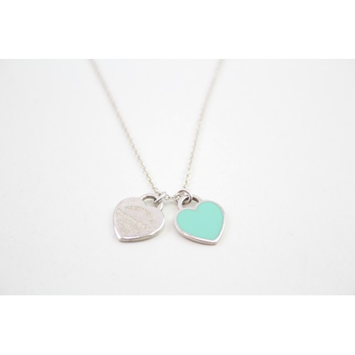 446 - Silver necklace with heart pendants by designer Tiffany & Co (3g)