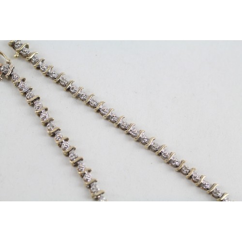 319 - 9ct gold diamond link bracelet (4g)