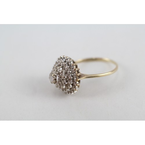 318 - 9ct gold diamond halo cluster ring (3.3g)