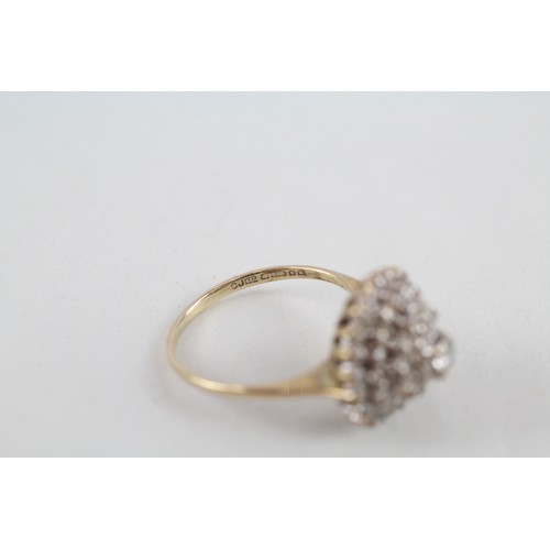 318 - 9ct gold diamond halo cluster ring (3.3g)