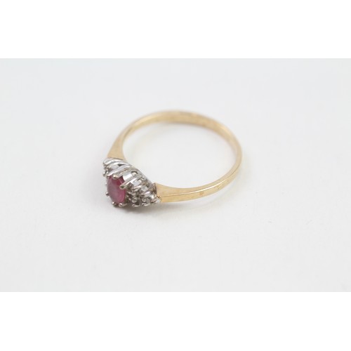 316 - 9ct gold diamond & ruby dress ring (2.1g)