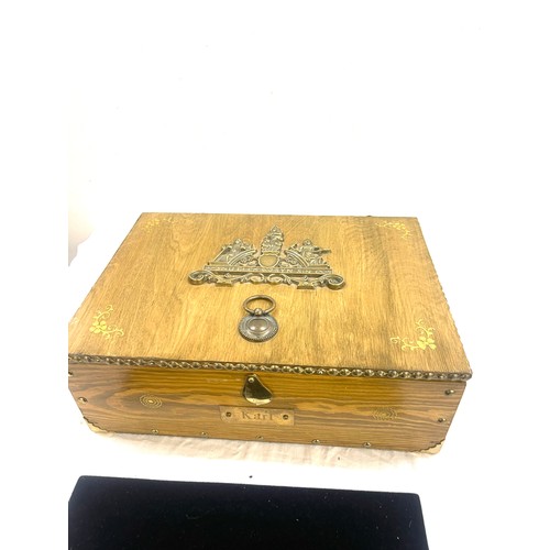 228 - Brass bound coin box measures approximately 5 inches tall 15 inches wide 11 inches depth