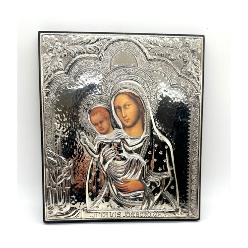 591 - Sterling silver religious icon, hall marked- measures approx 8.5 inches tall by 7.5 wide