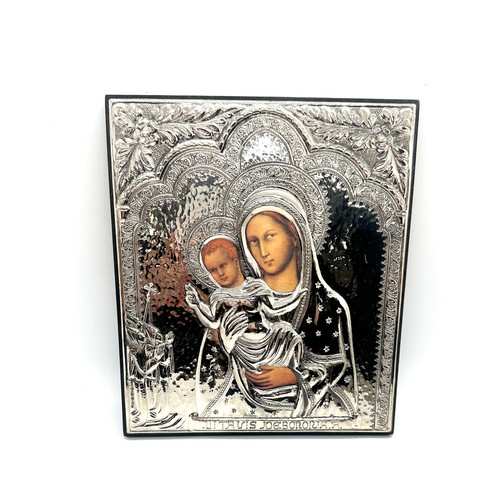 591 - Sterling silver religious icon, hall marked- measures approx 8.5 inches tall by 7.5 wide