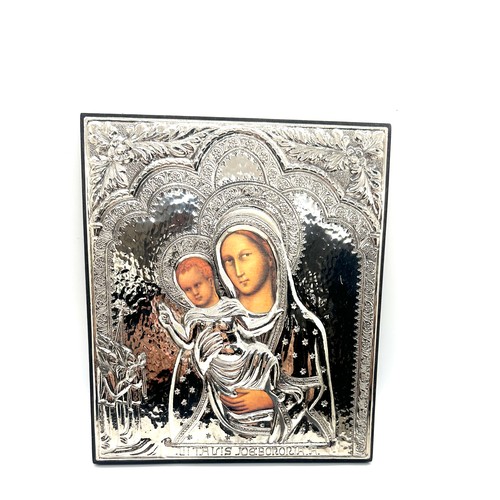 591 - Sterling silver religious icon, hall marked- measures approx 8.5 inches tall by 7.5 wide