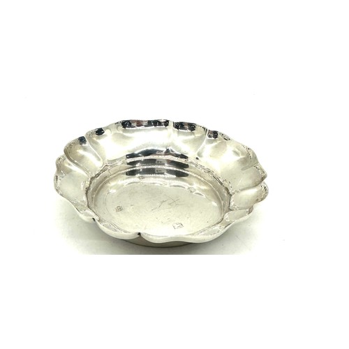 579 - 1970 silver hallmarked dish measures approx 4 inches diameter by 1 inch deep