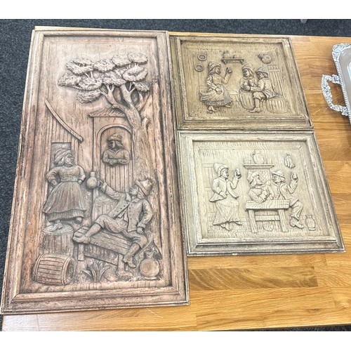 131 - Wooden carved wall hanging plaques largest measures approx 25 inches long by 12 inches wide