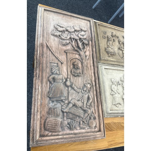 131 - Wooden carved wall hanging plaques largest measures approx 25 inches long by 12 inches wide