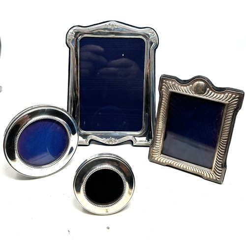 386 - 4 x .925 sterling photograph frames