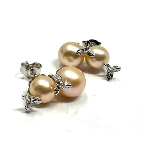 131 - 18ct white gold pearl & diamond earrings weight approx 5g