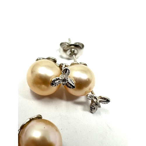 131 - 18ct white gold pearl & diamond earrings weight approx 5g