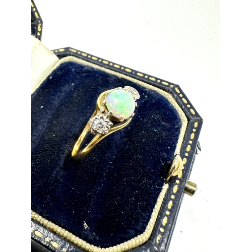 118 - 18ct gold diamond & opal ring weight 2.5g xrt as 18ct gold