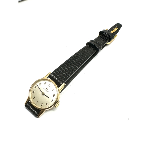 486 - 9ct gold ladies tissot wristwatch  the watch is ticking