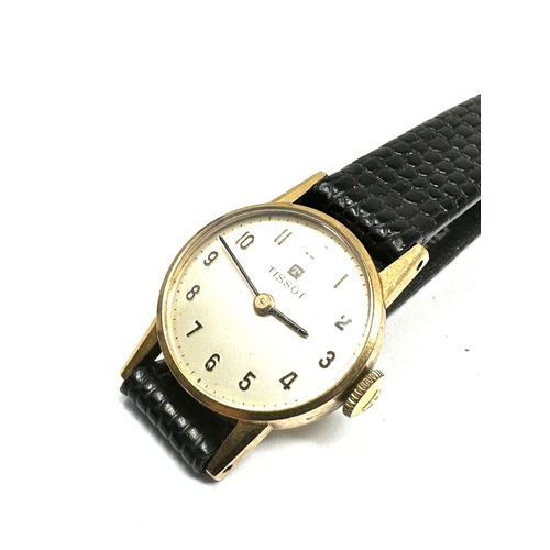 486 - 9ct gold ladies tissot wristwatch  the watch is ticking