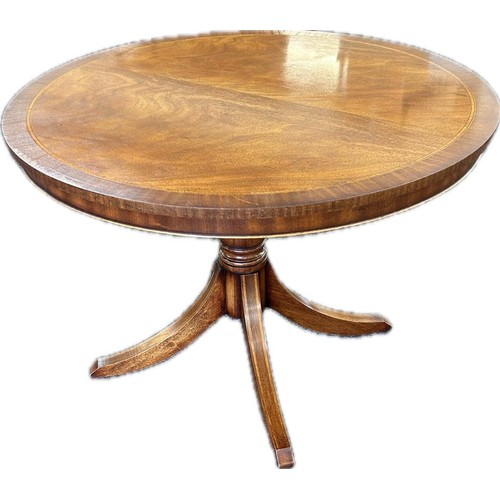 328 - Tilt top mahogany table measures 41 inches diameter 30 inches tall