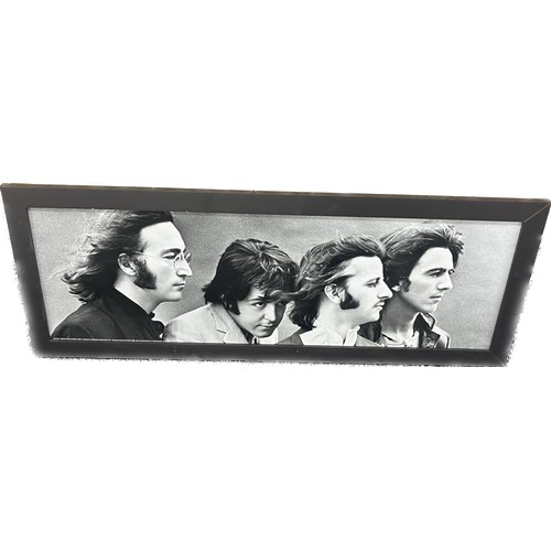 116 - Framed Beatles print measures 36 inches by 16 inches