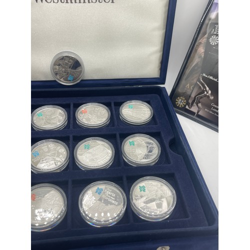 460 - Cased Silver Olympic coin set all with COAS, 24 silver coins inc total