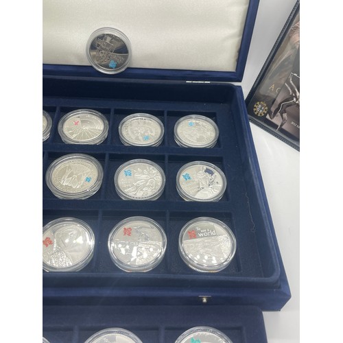 460 - Cased Silver Olympic coin set all with COAS, 24 silver coins inc total