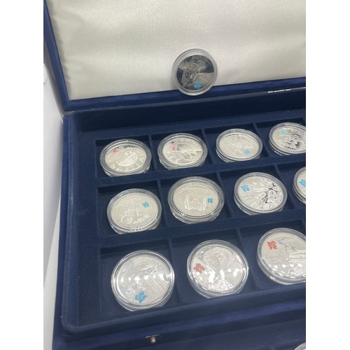 460 - Cased Silver Olympic coin set all with COAS, 24 silver coins inc total