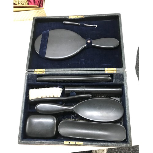 125 - Vintage Ebony and Bakelite grooming set and ornate dressing table set