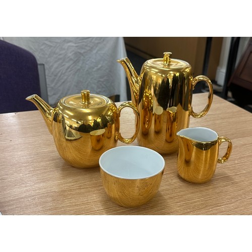 136 - Royal Worcester gold tea pot, coffee pot, milk jug and sugar bowl