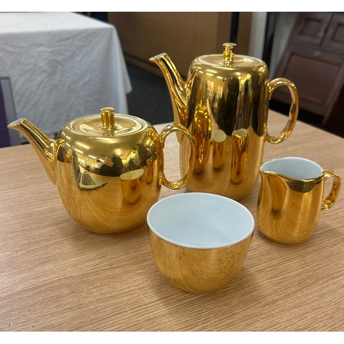 136 - Royal Worcester gold tea pot, coffee pot, milk jug and sugar bowl