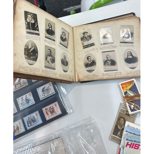 96 - Selection of used and new stamps, first day covers together with vintage cigarette cards