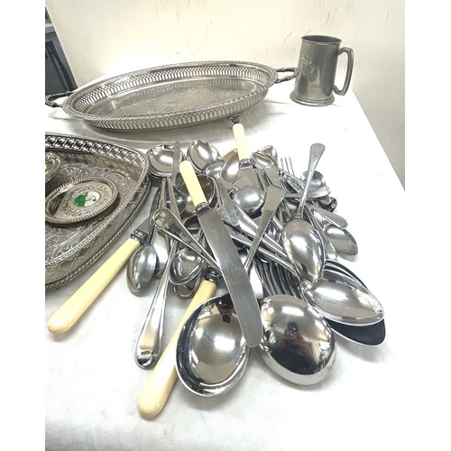 112 - Selection of metal ware includes trays, cutlery etc