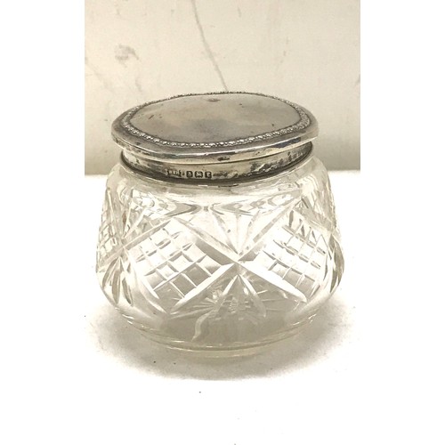 479 - 3 Hallmarked silver topped perfume jars