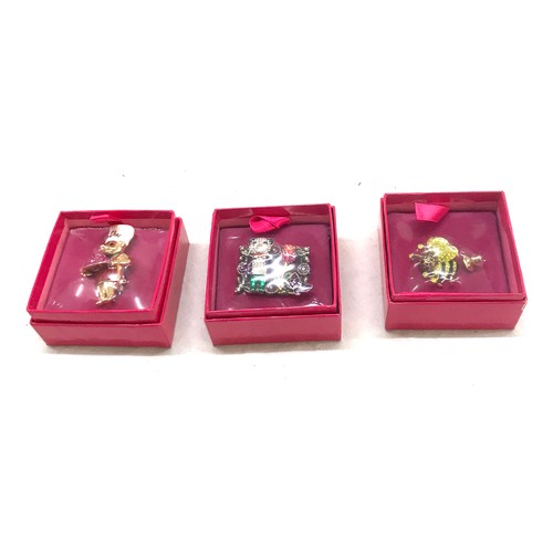 524 - Three Brand new in boxes Butler and Wilson Brooches includes Panda, pig and bee