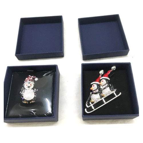 537 - 2 Boxed Butler and Wilson Penguin brooches