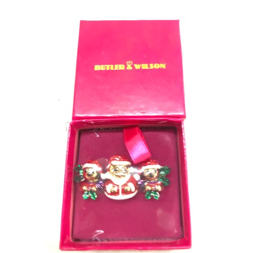 532 - Four Boxed Butler and Wilson Christmas themed brooches, 3 have never been out of the packaging