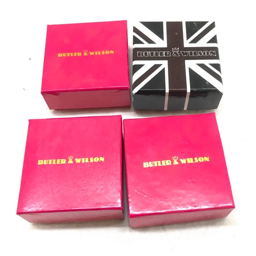 532 - Four Boxed Butler and Wilson Christmas themed brooches, 3 have never been out of the packaging